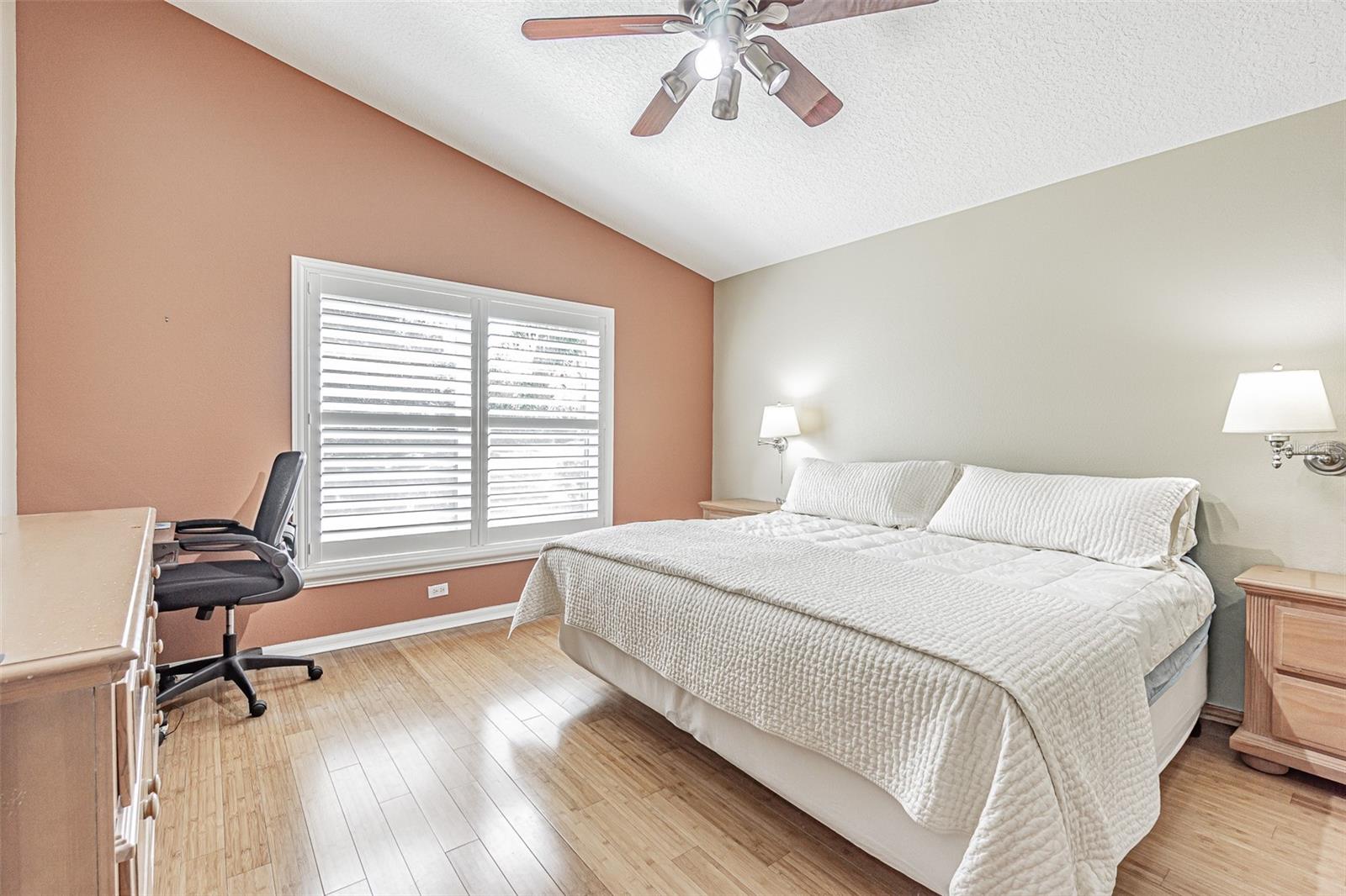 Primary suite with vaulted ceilings