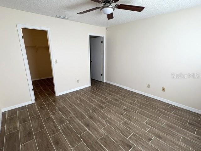 Primary bedroom with walk in closet and bathroom.