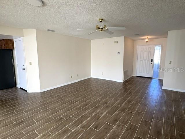 Living area toward front entry.