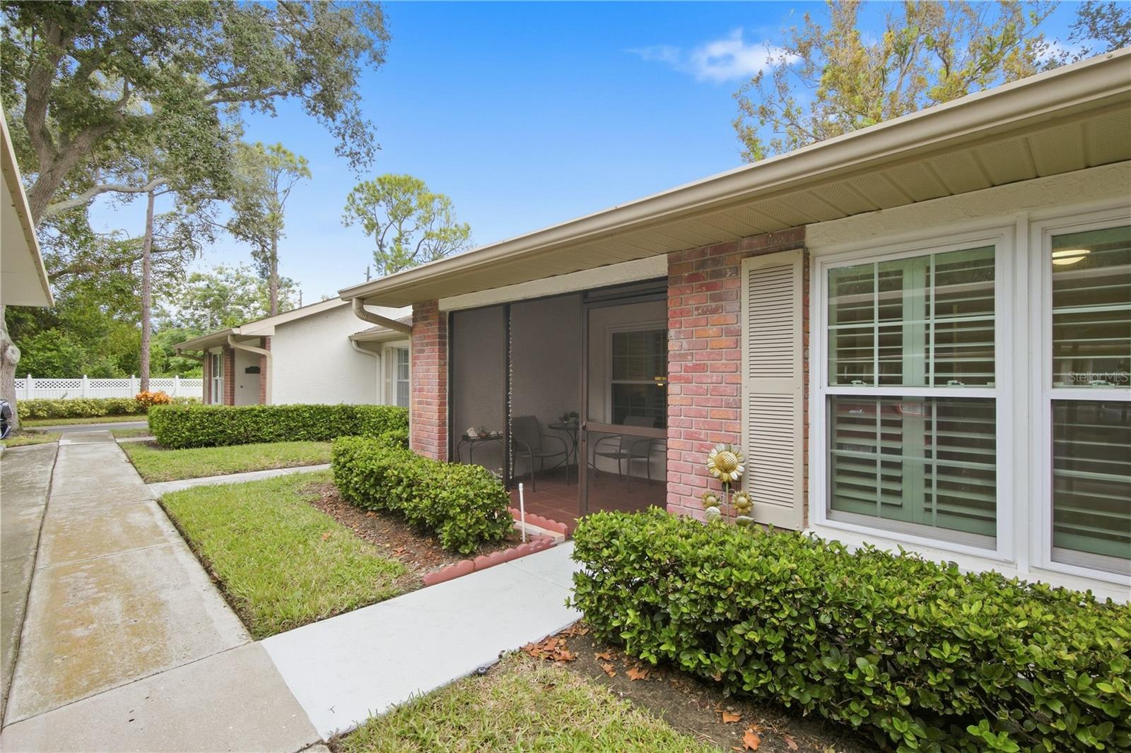 Welcoming Screened Front and Back Patios
