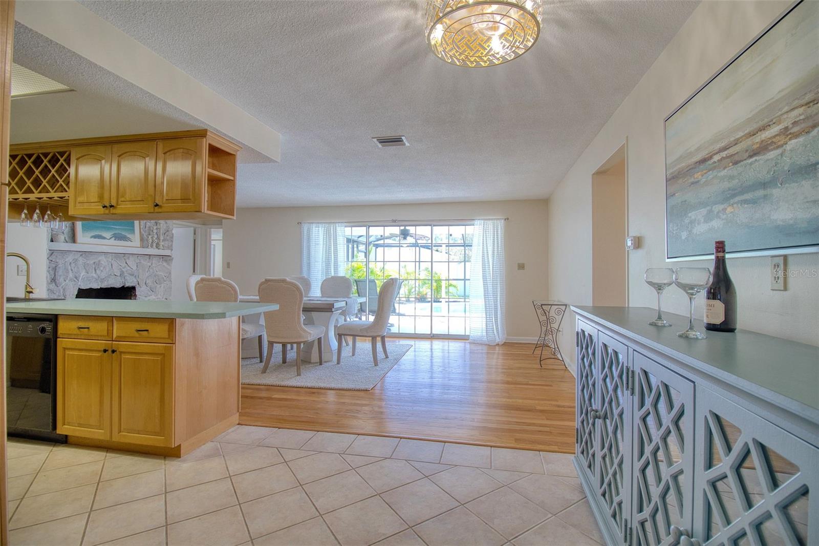 Through kitchen and sliders to pool
