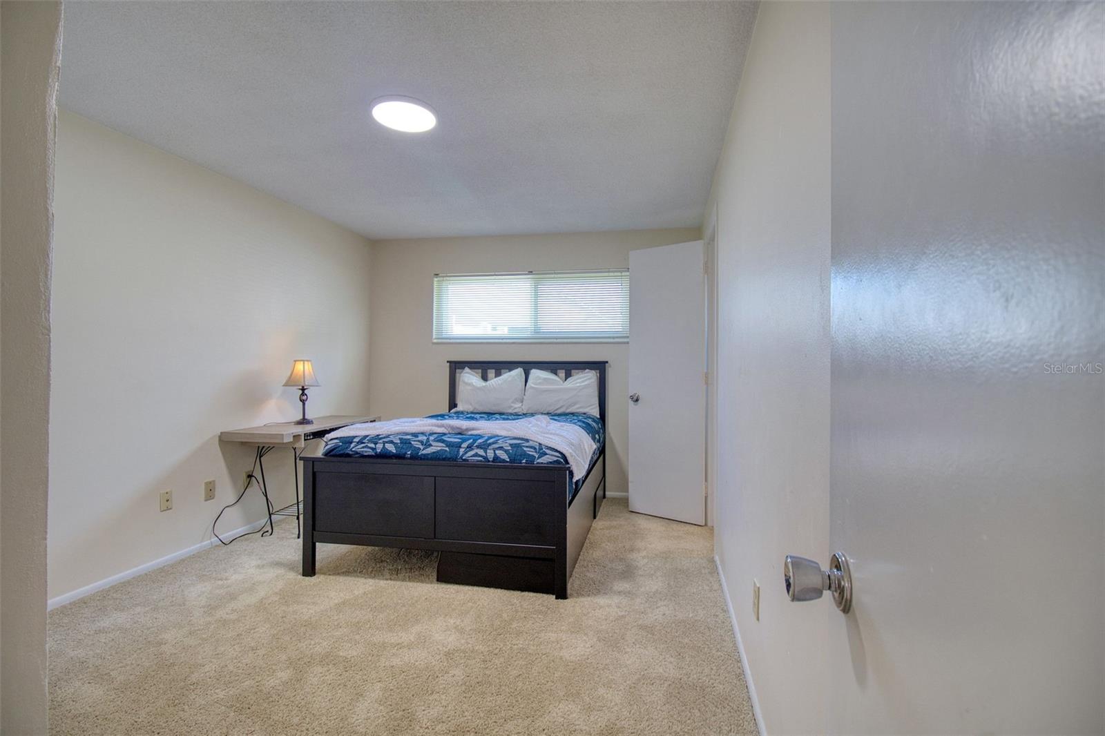 Bedroom next to primary with shared bath