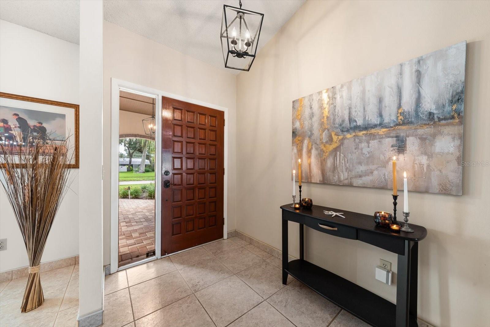 Beautiful soaring ceilings in the entry and formal Leisure and Dining spaces.