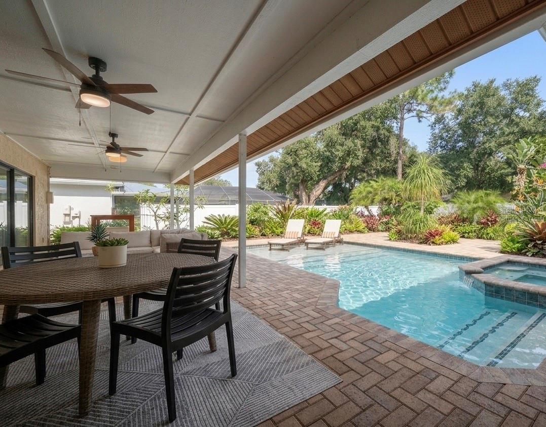 Looking out from the patio at a virtually staged pool concept for the backyard.