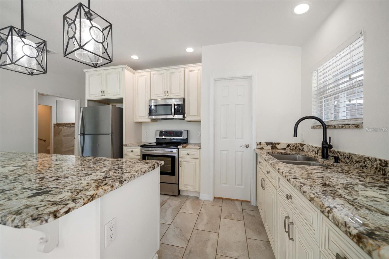 Full second kitchen! Granite countertops and custom cabinets!