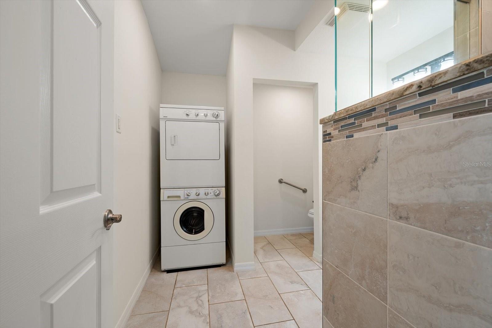 Private laundry and water closet complete the perfect ADU experience!