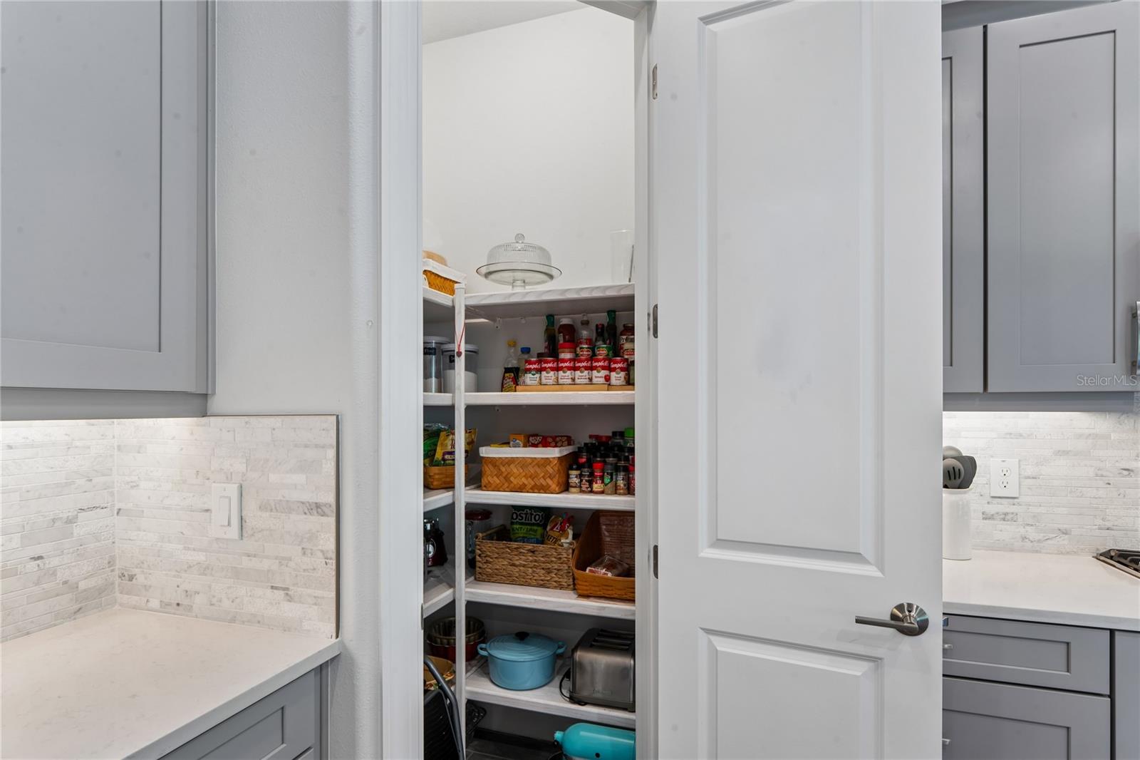 Custom built-in wood shelf pantry
