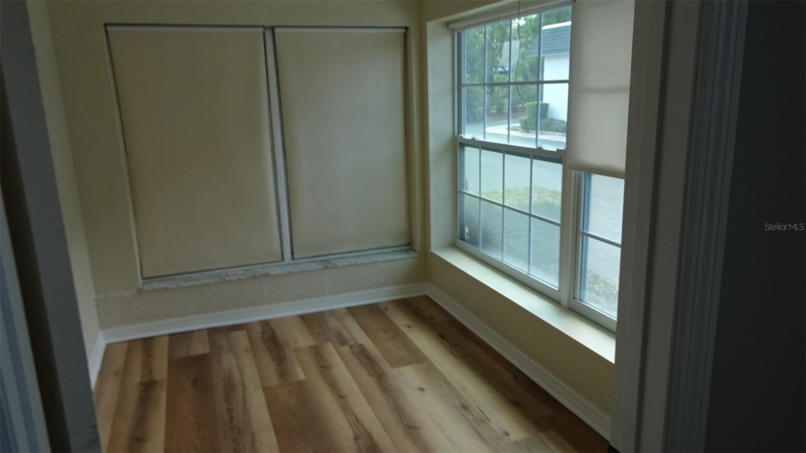 Front room facing south, den/office