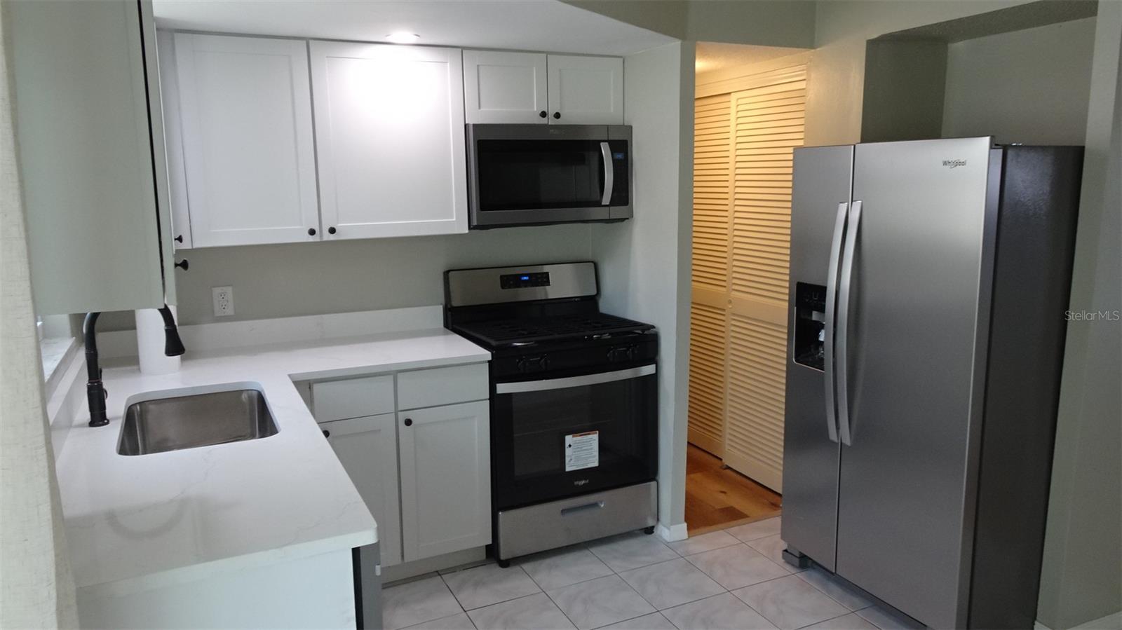 Natural gas stove. Pantry in the hallway.