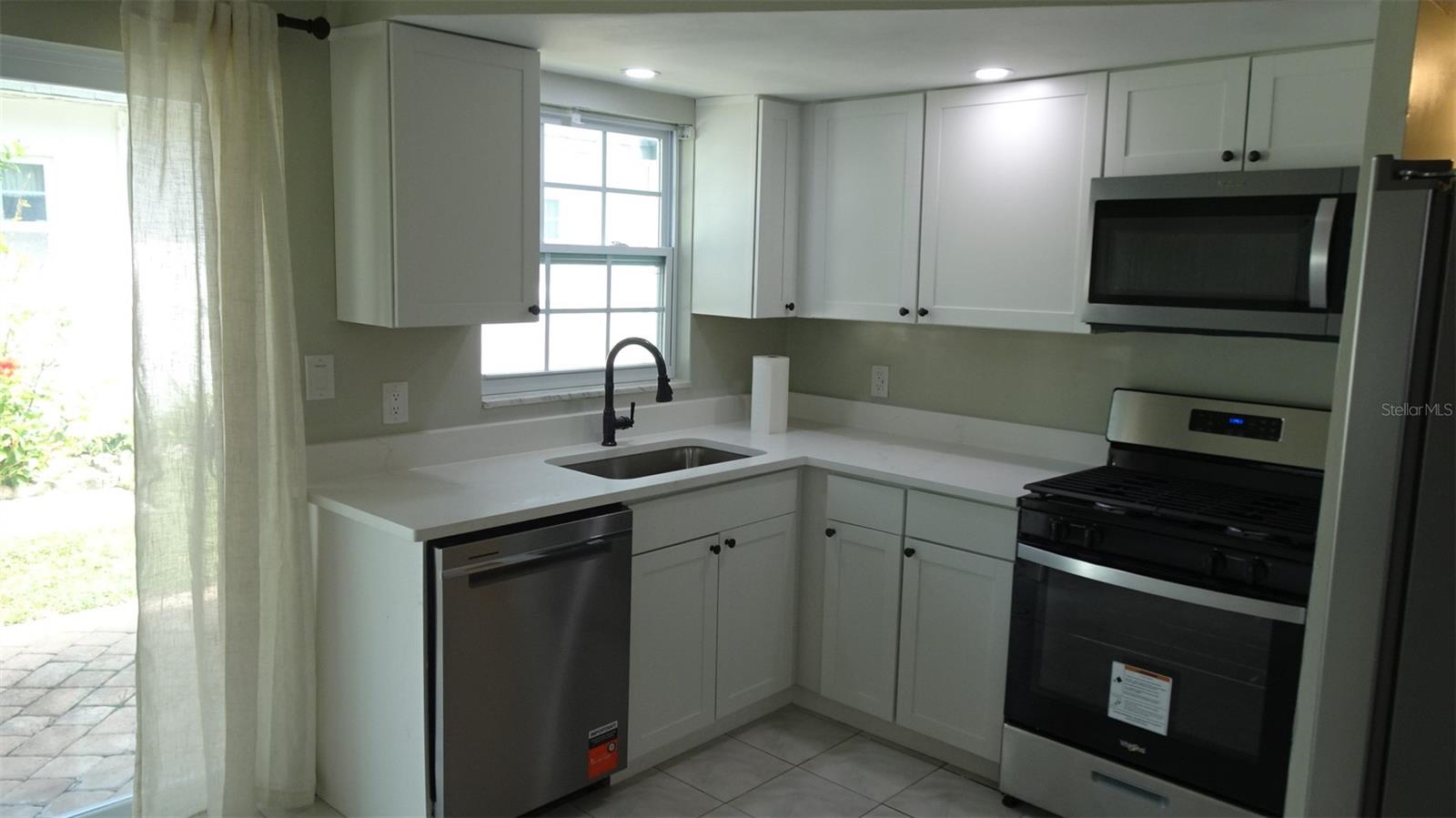 Natural light from the north facing window and door.