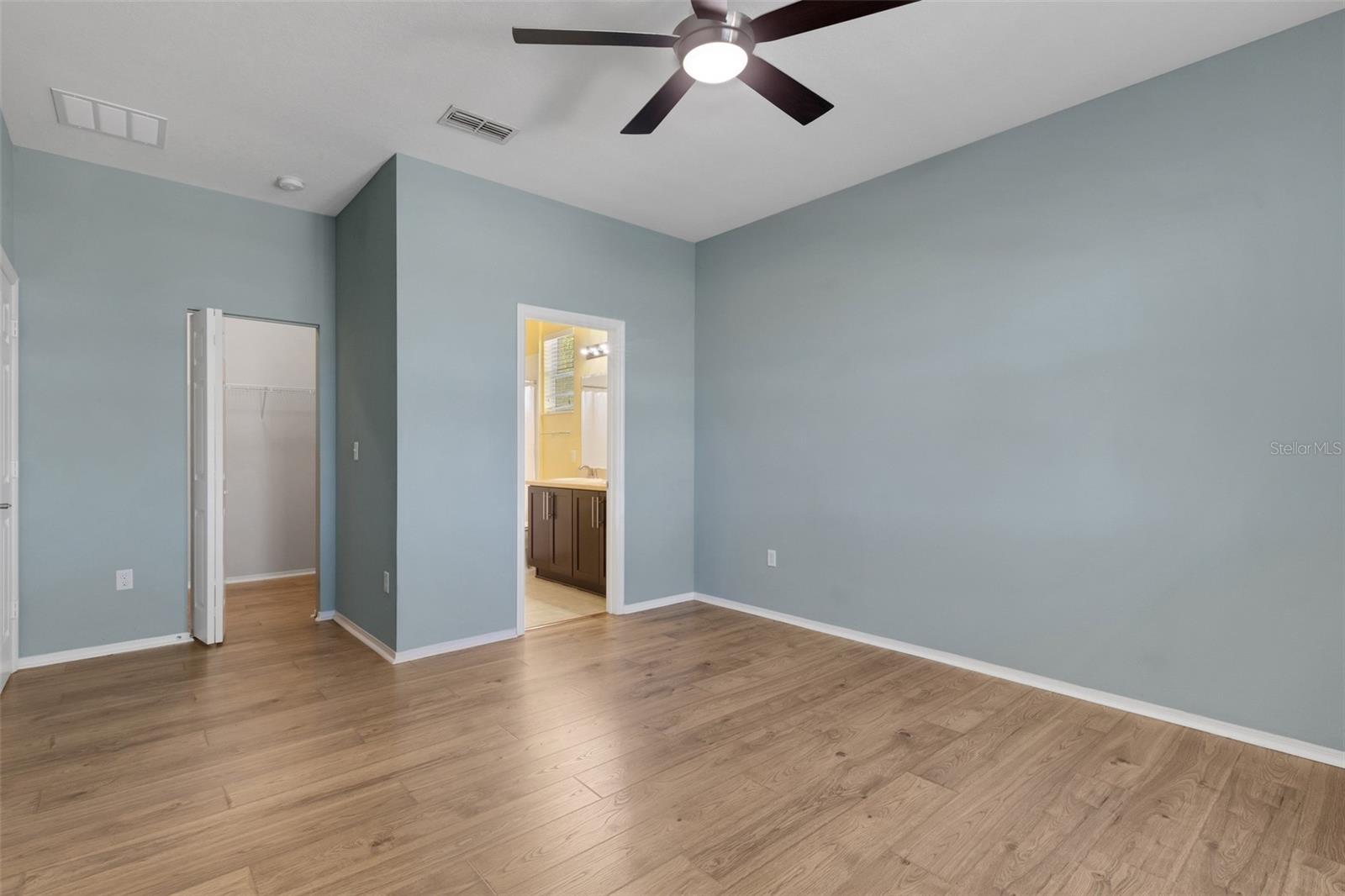 Primary Suite with Ensuite Bathroom & Walk-In Closet