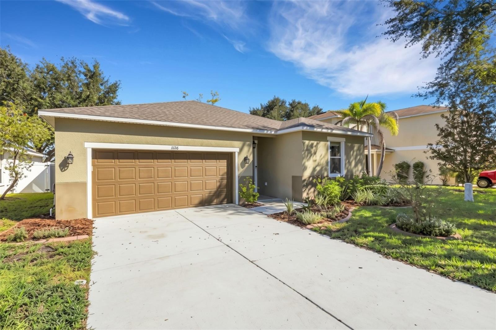 Front Elevation with Oversized Two Car Garage with Overhead Storage Front Elevation with Oversized Two Car Garage with Overhead Storage