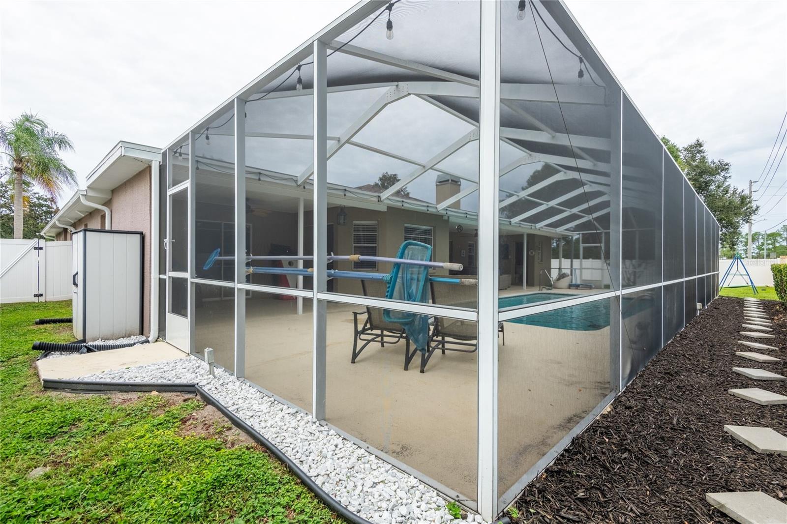 Side yard with a shed.