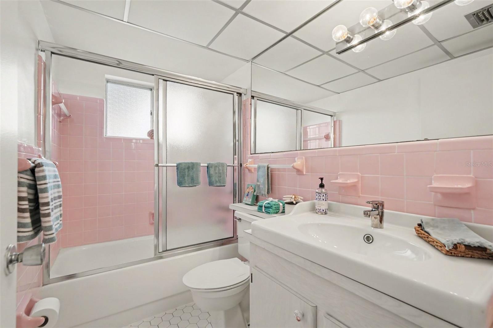 Hall bath has full size tub/shower and an updated vanity too!