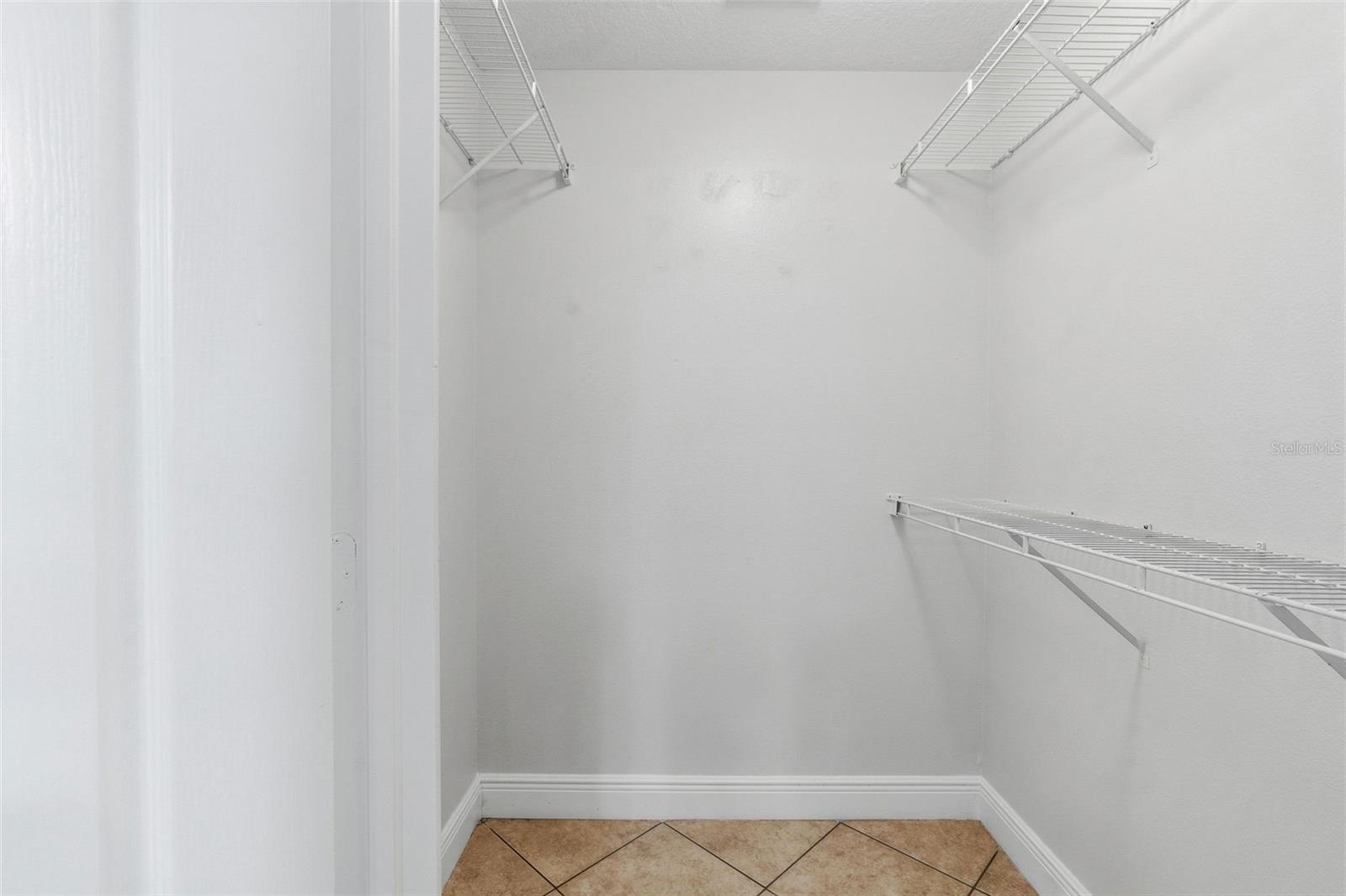 MASTER BEDROOM WALK IN CLOSET