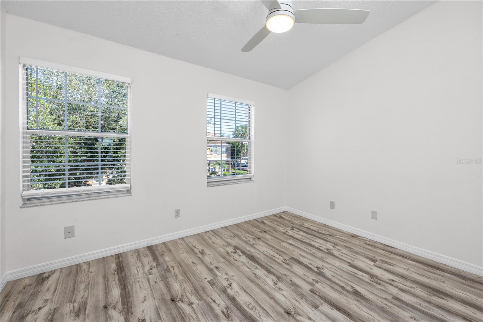 Second Bedroom with Ensuite Bath & LVP -6229 Bayside Key Dr, Tampa, FL 33615