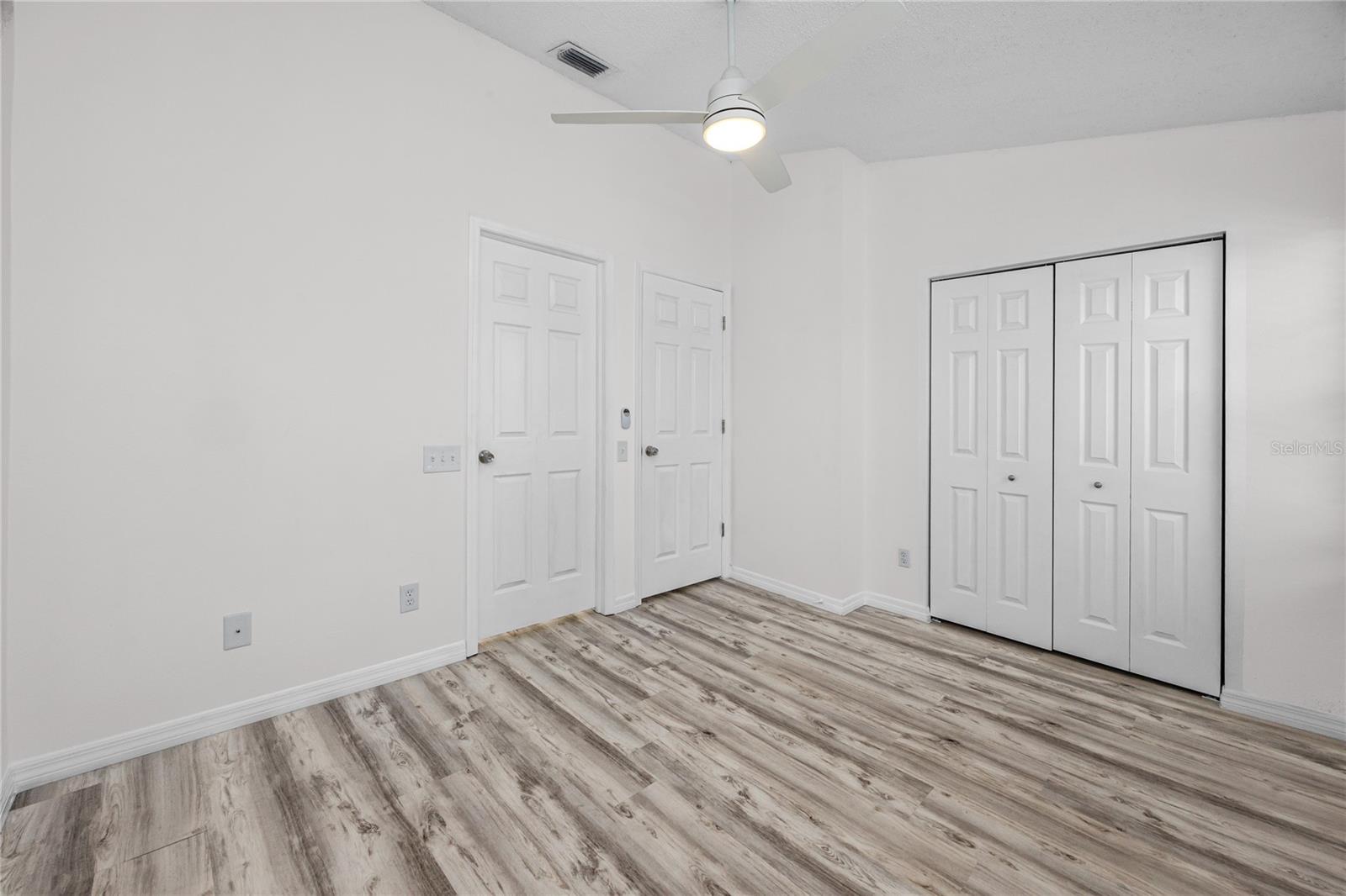 Second Bedroom with Ensuite Bath & LVP -6229 Bayside Key Dr, Tampa, FL 33615
