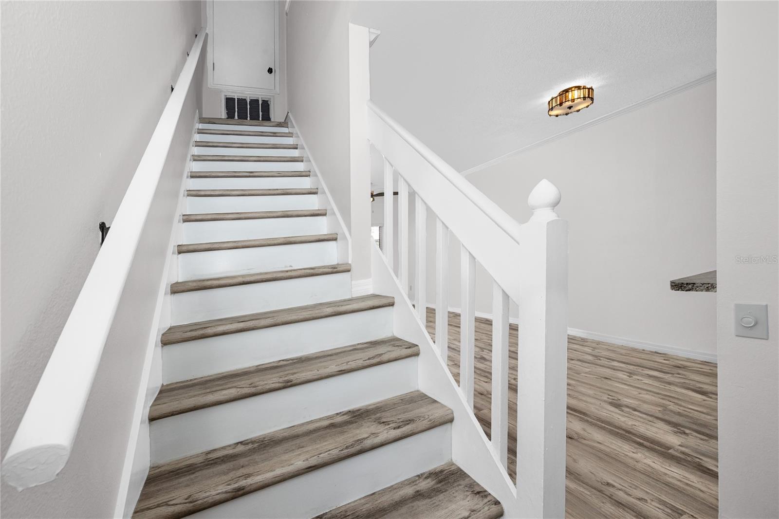 Staircase with Luxury Vinyl Plank -6229 Bayside Key Dr, Tampa, FL 33615