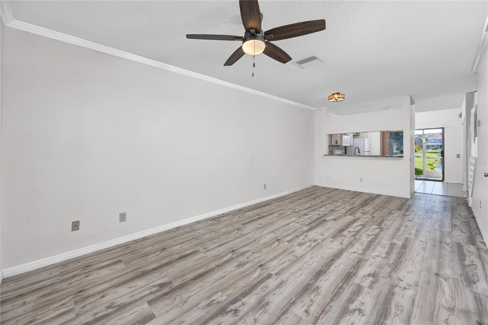 Open concept living area with Luxury Vinyl Plank -6229 Bayside Key Dr, Tampa, FL 33615 Open concept living area with Luxury Vinyl Plank -6229 Bayside Key Dr, Tampa, FL 33615