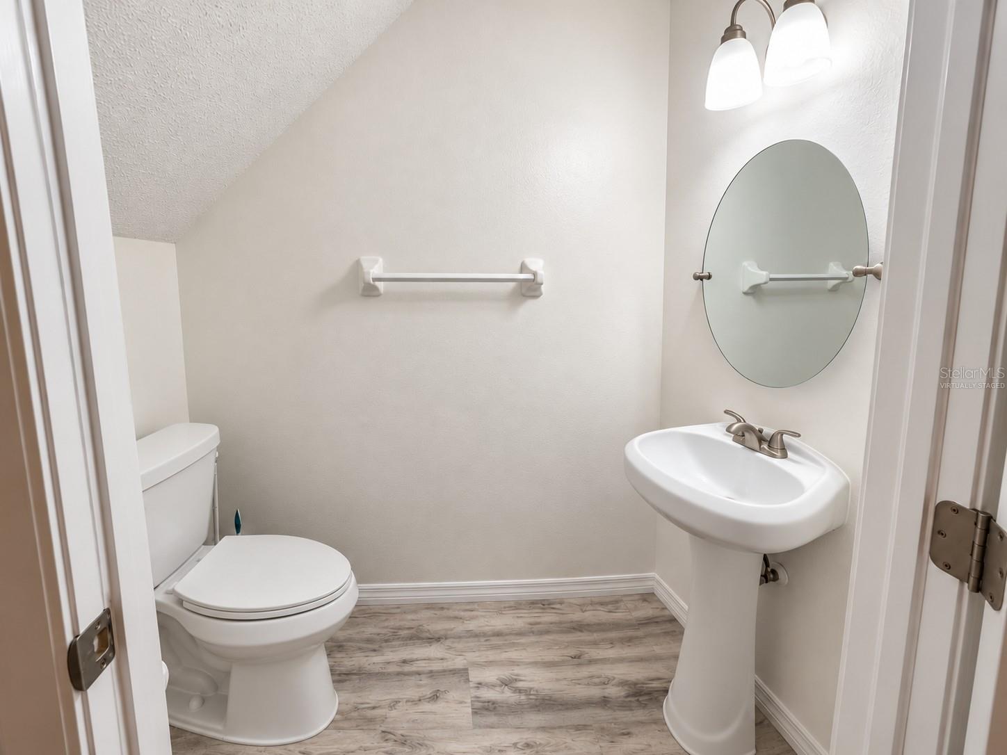 Half Bath Downstairs Virtually staged -6229 Bayside Key Dr, Tampa, FL 33615
