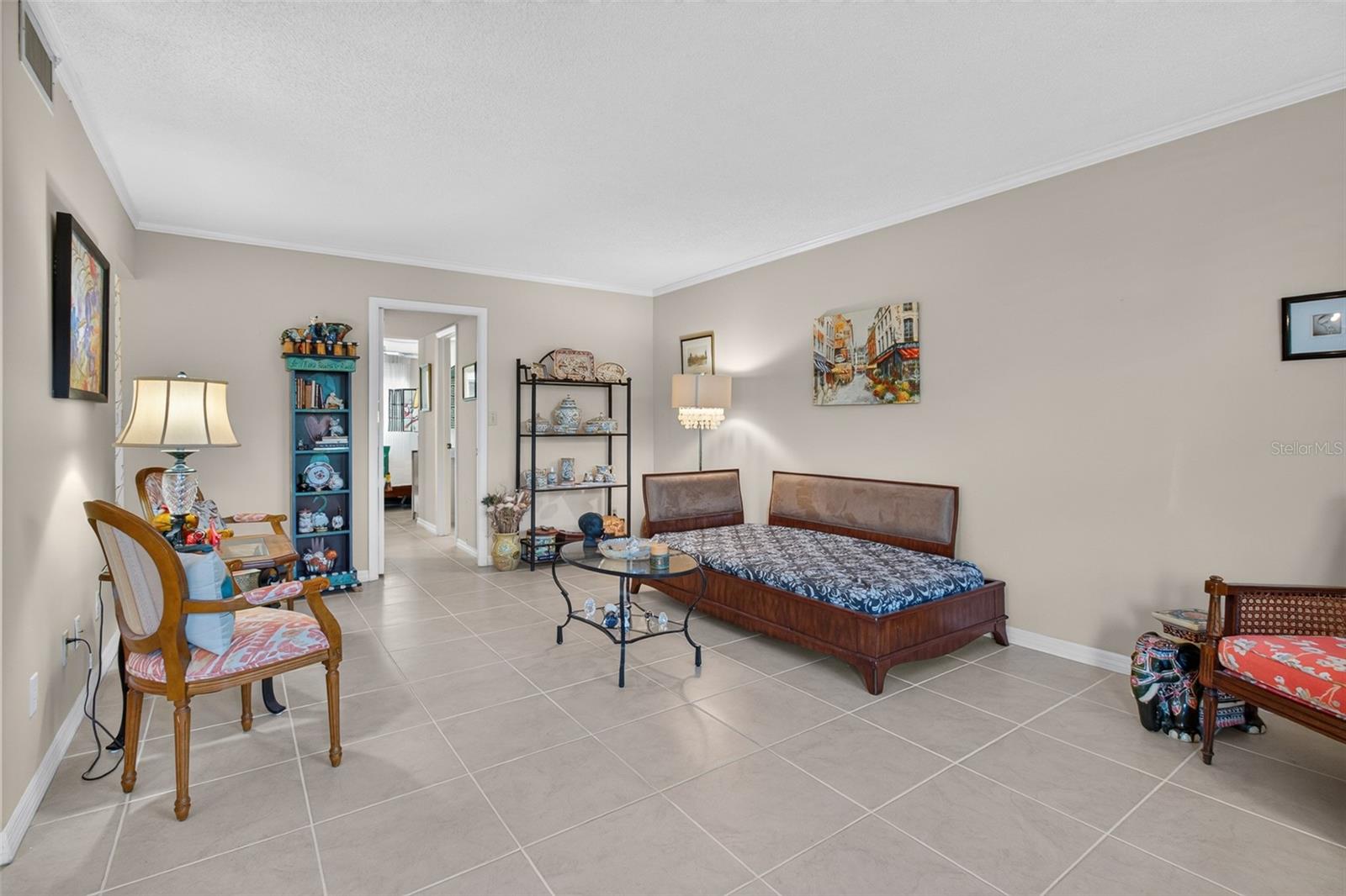 Living room with doorway to ensuite bedroom