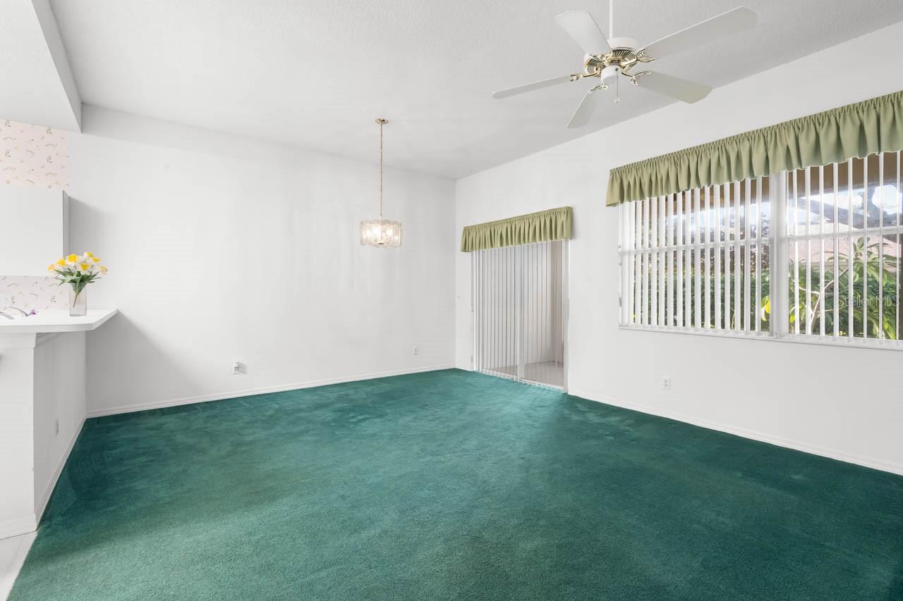 Great room with sliders to screened lanai