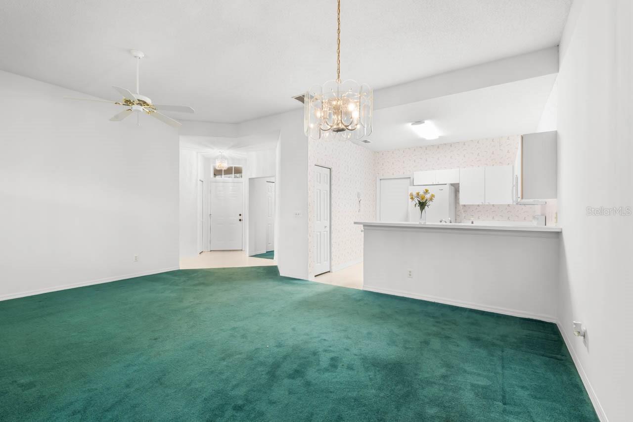 Front door entry way, kitchen, and great room