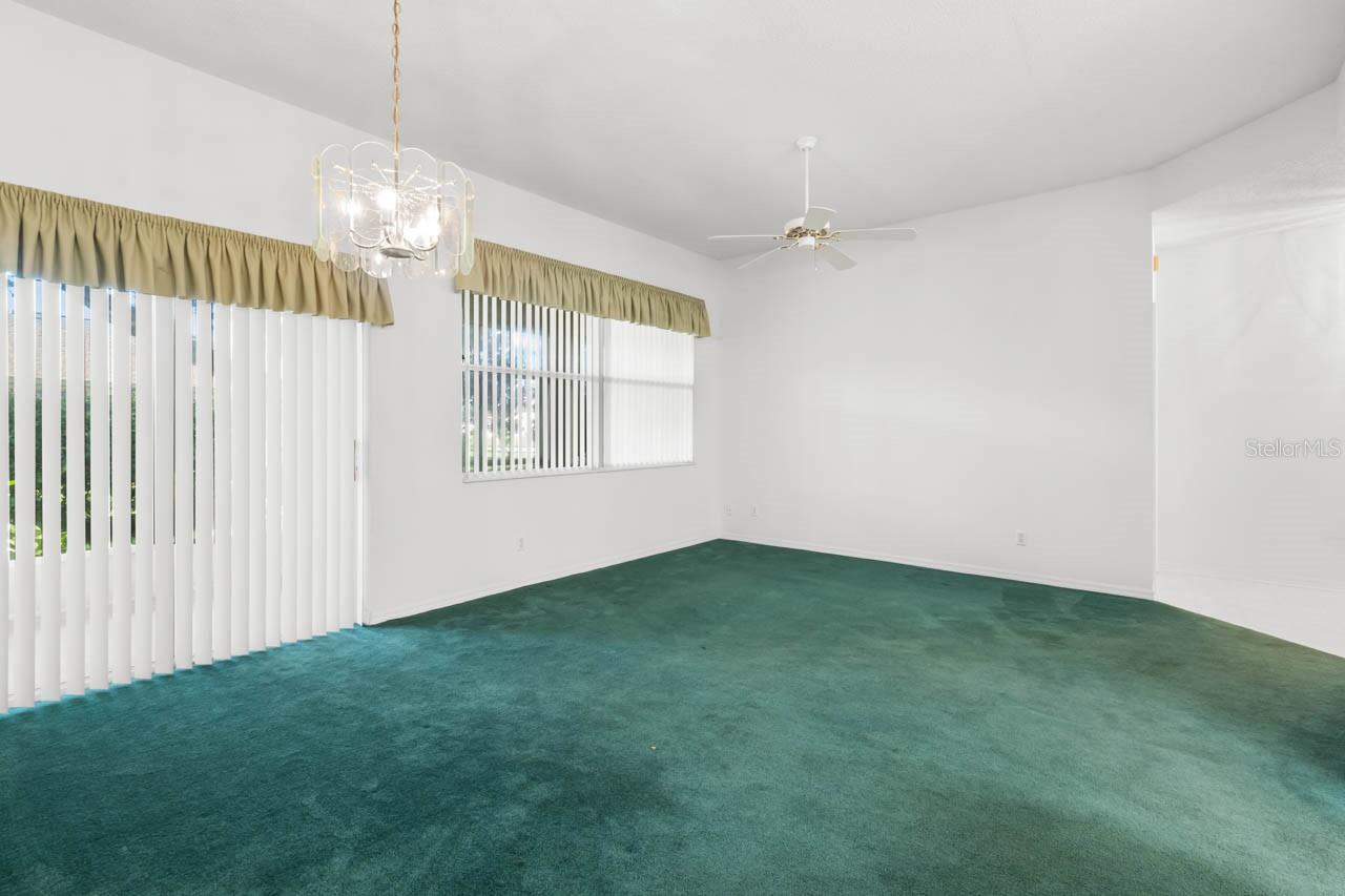 Great room with sliders to the screened lanai