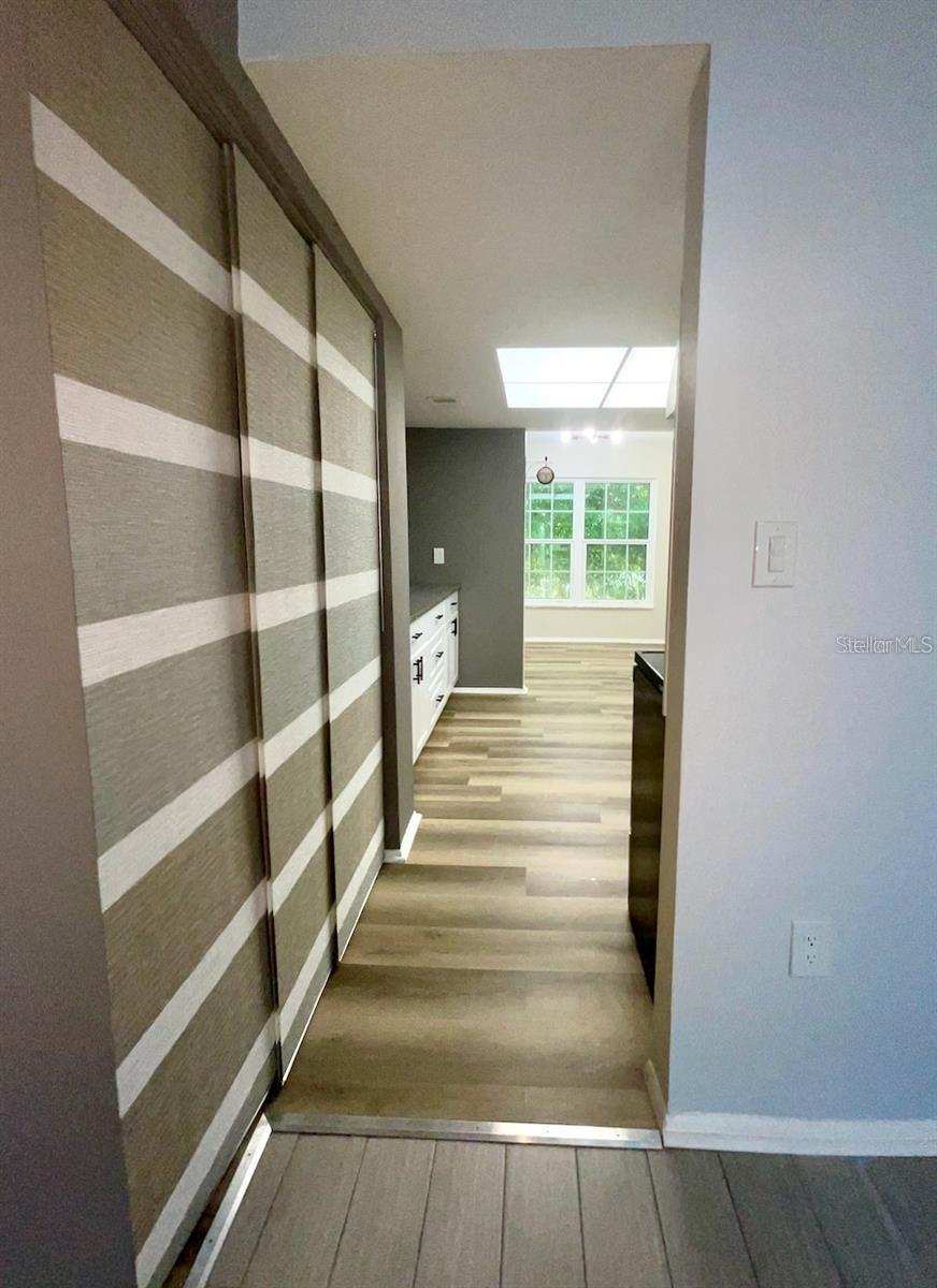 Pantry closet and doorway to kitchen from dining area