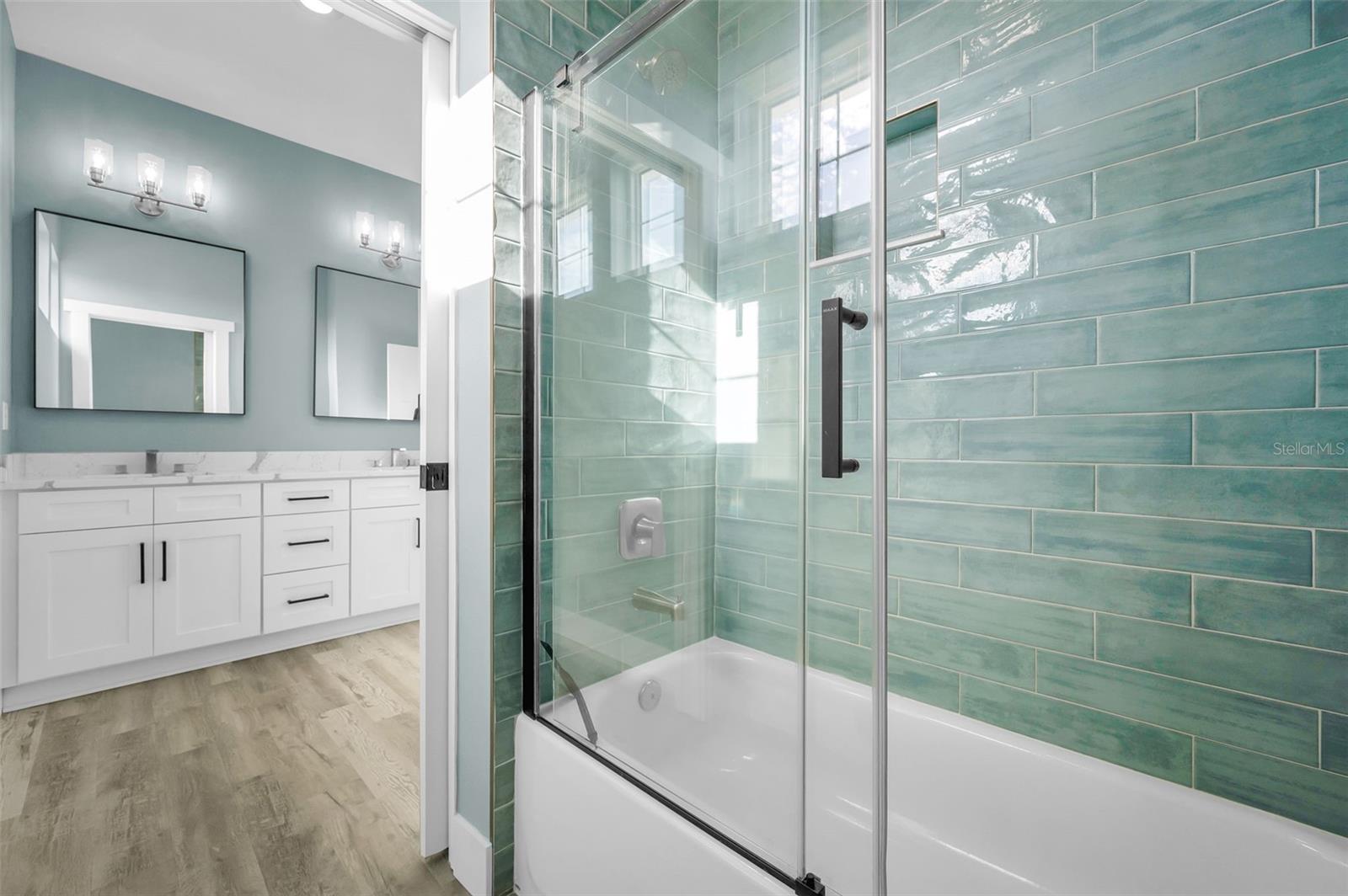Upper Level Full bath with double sinks and Quartz counters