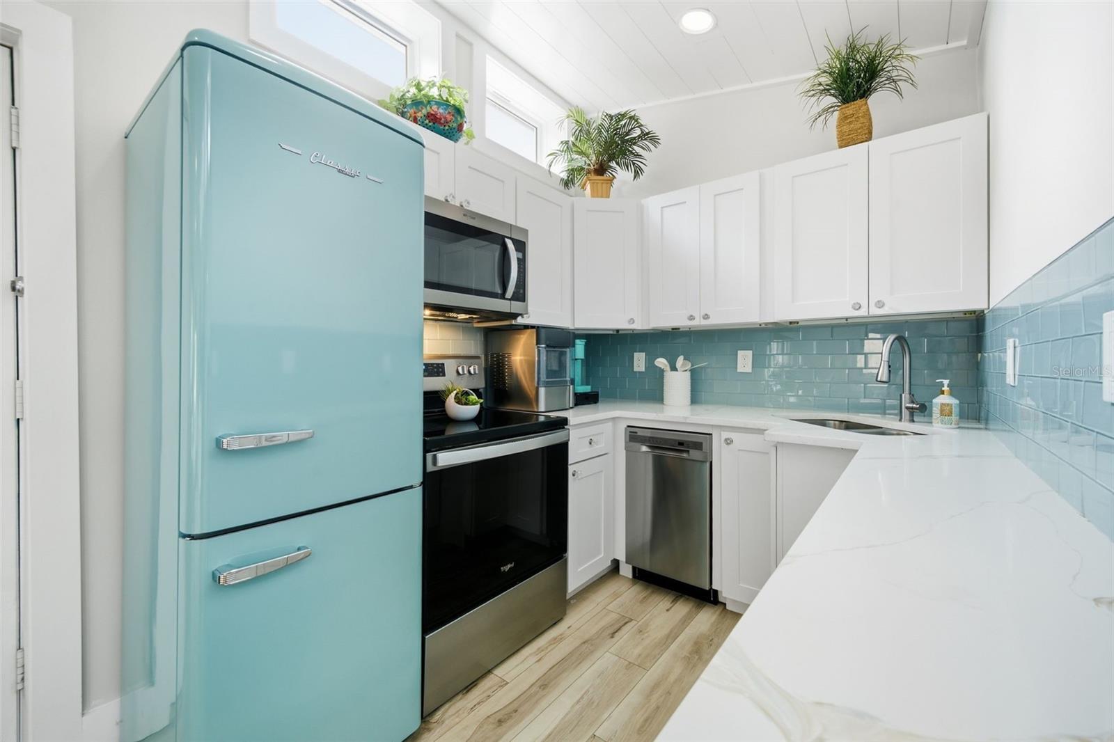 Stylish kitchen with quartz countertops