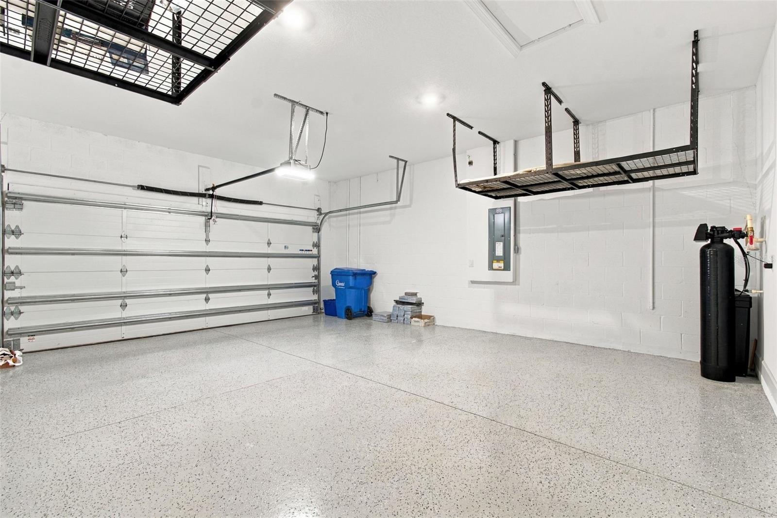 The garage has the four foot extension option, epoxied floors and built-in storage racks