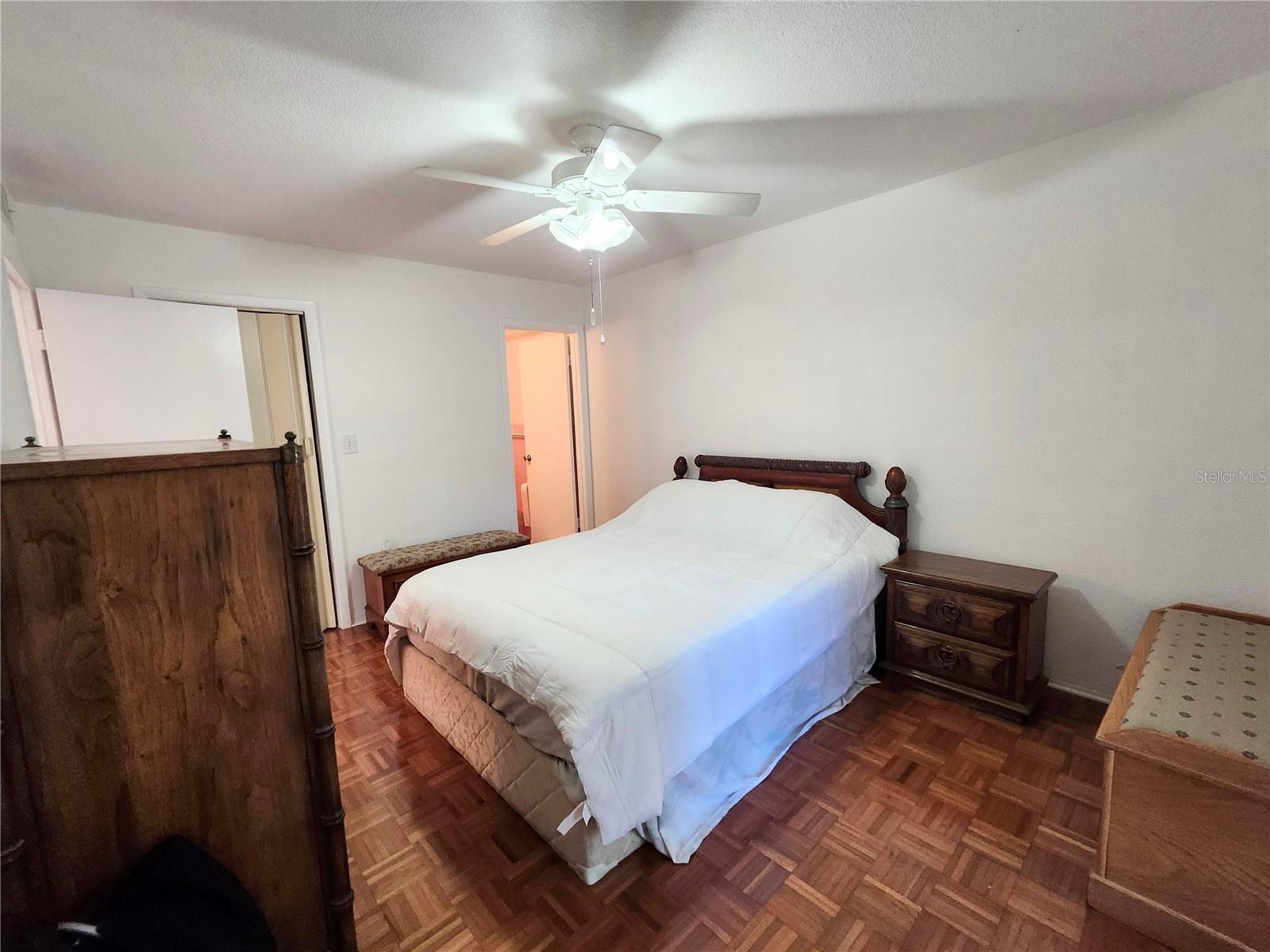 Primary bedroom with walk in closet