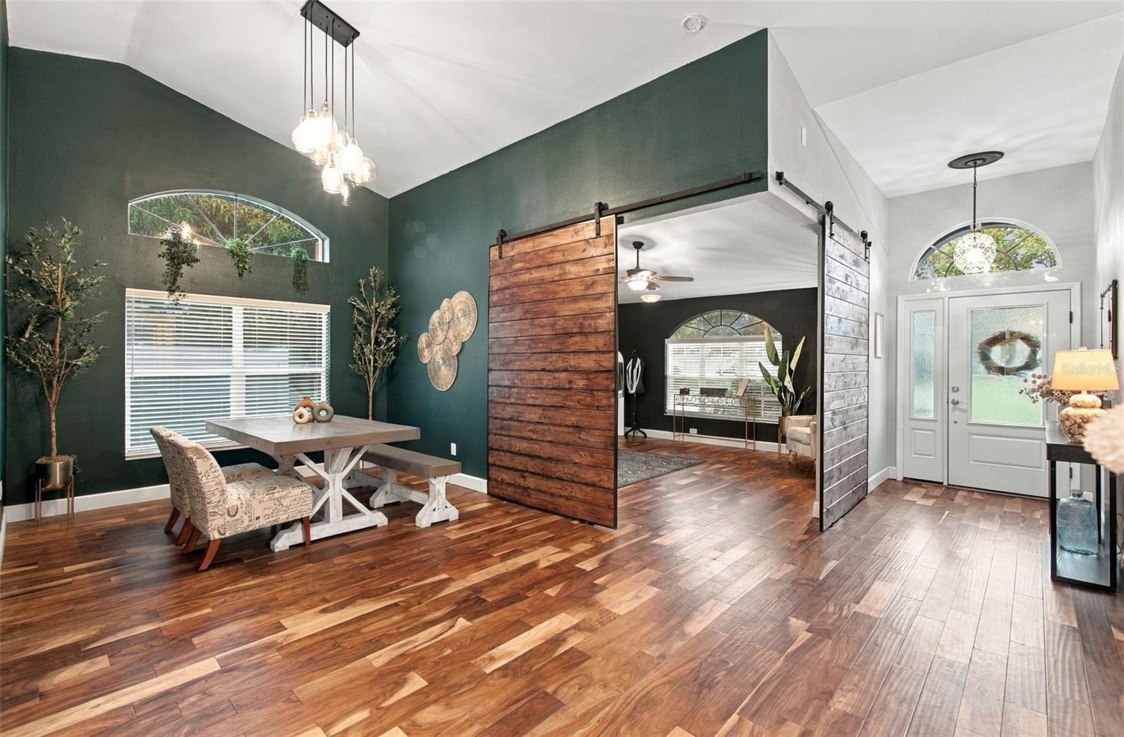 Formal living area leading into bonus room