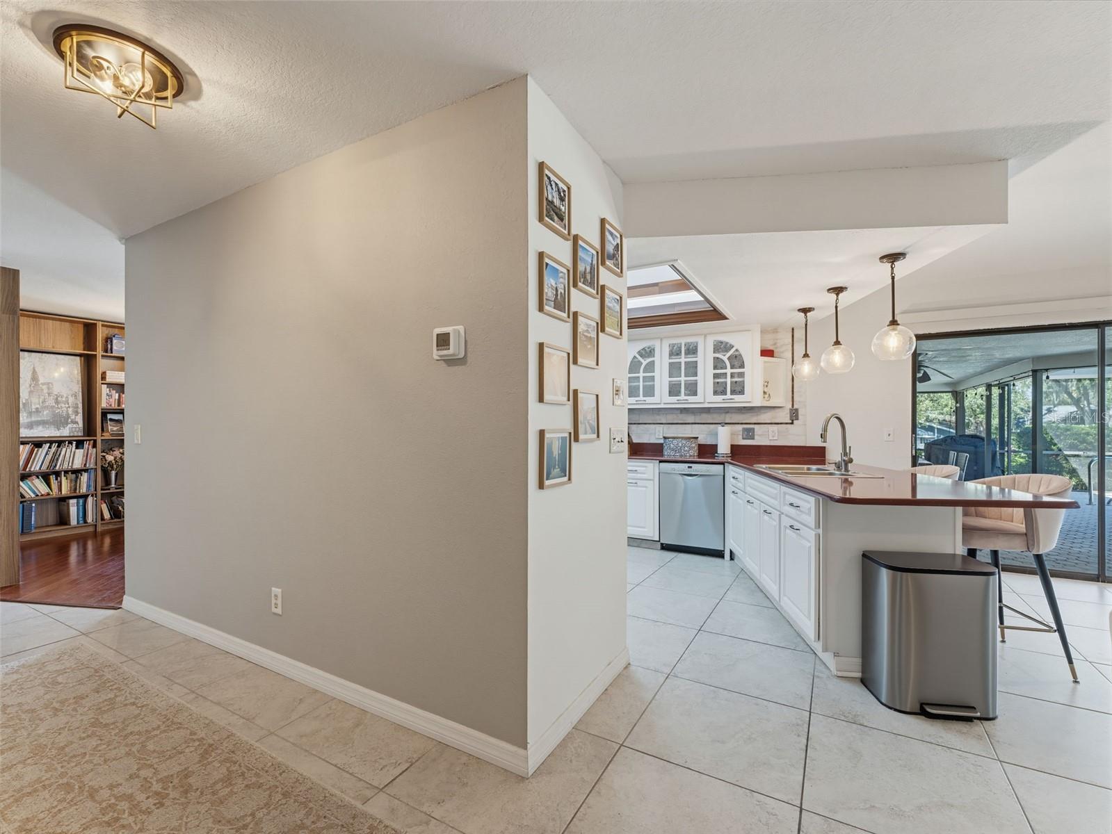 Entry to Hall and Kitchen from Dining area