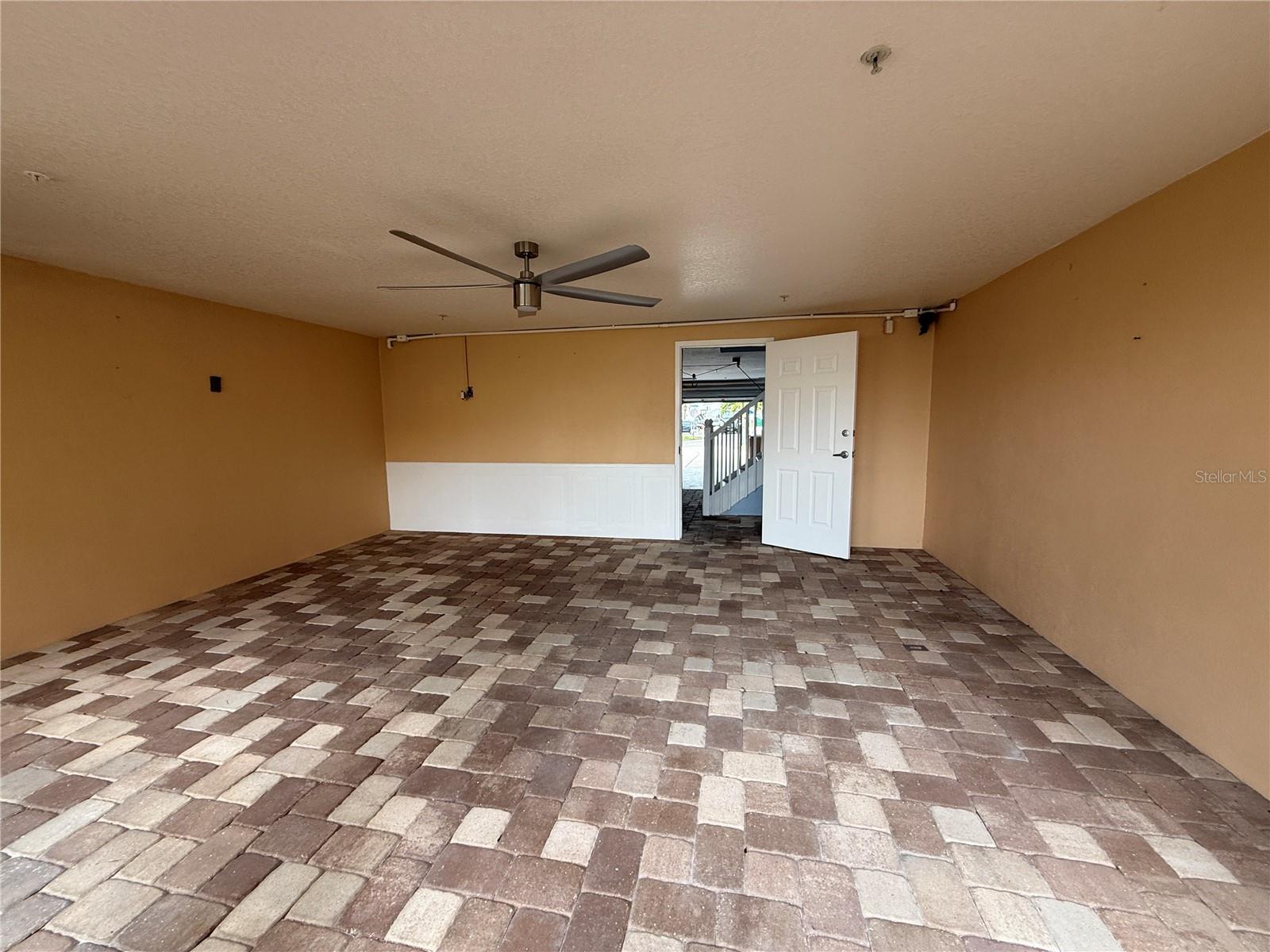Covered Patio Facing the Water in the Rear of the Townhome