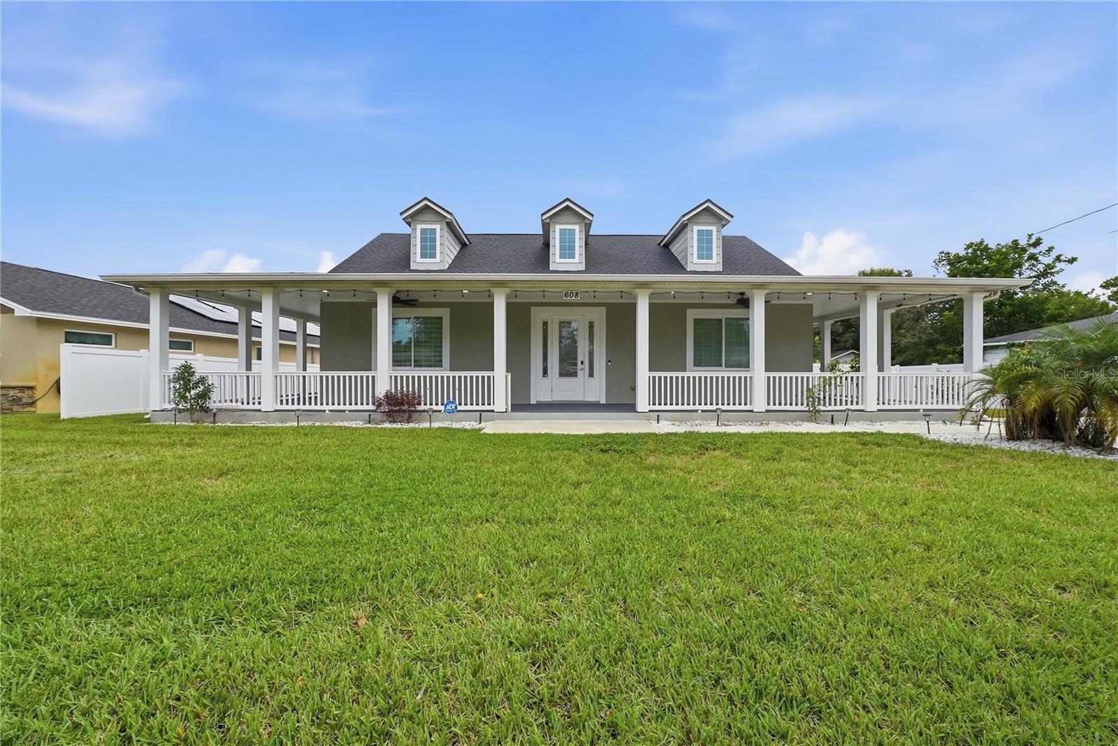 Front Exterior View with beautiful wrap around porch Front Exterior View with beautiful wrap around porch