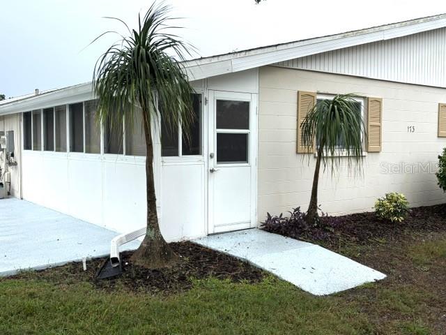 Back of home features with entrance to lanai.