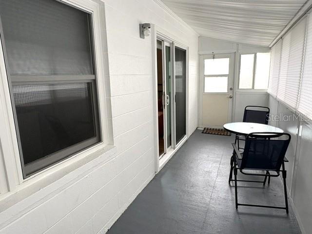 Door at the end of the lanai is convenient to the assigned parking space.