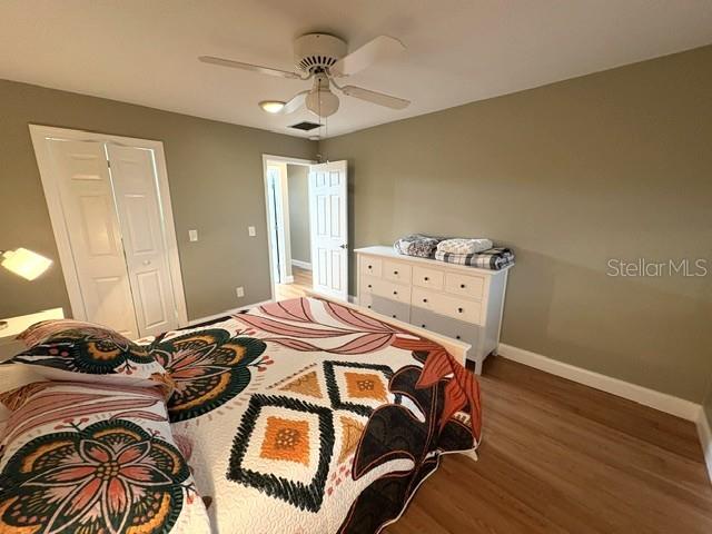 Primary bedroom facing hallway, walk in closet is convenient.
