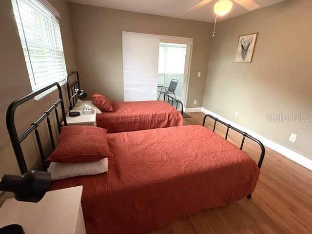 Impact resistant sliding glass doors lead from the guest room to the enclosed lanai.