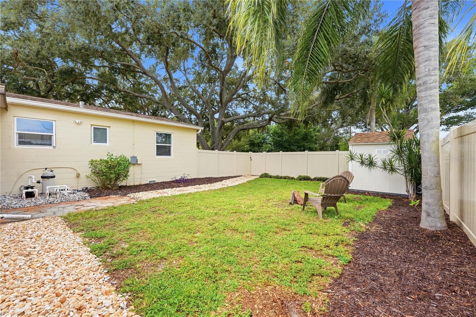 Generous backyard! A larger gate could be added by a new owner to allow for RV or boat parking.