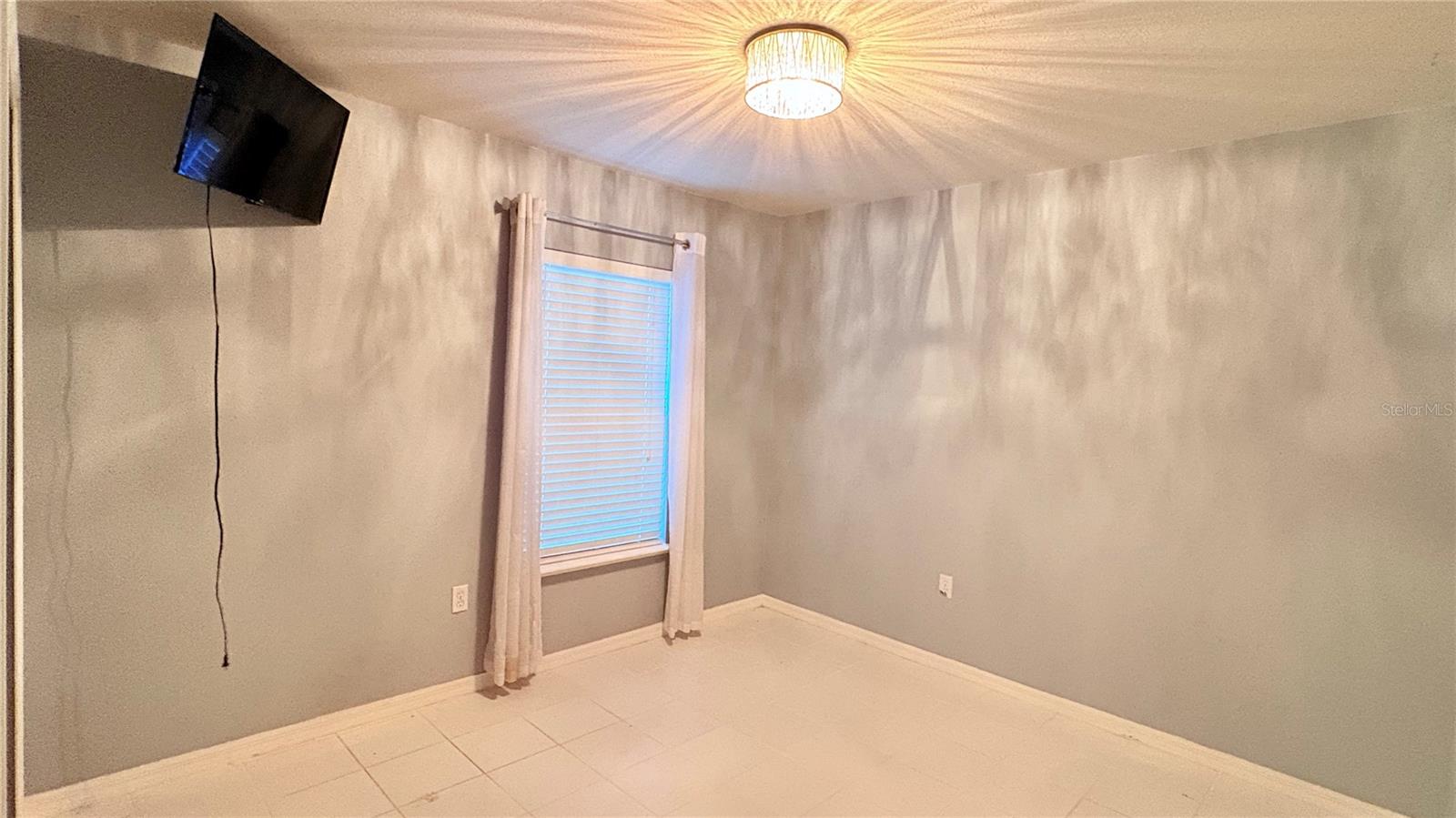 3rd bed with wall mounted TV