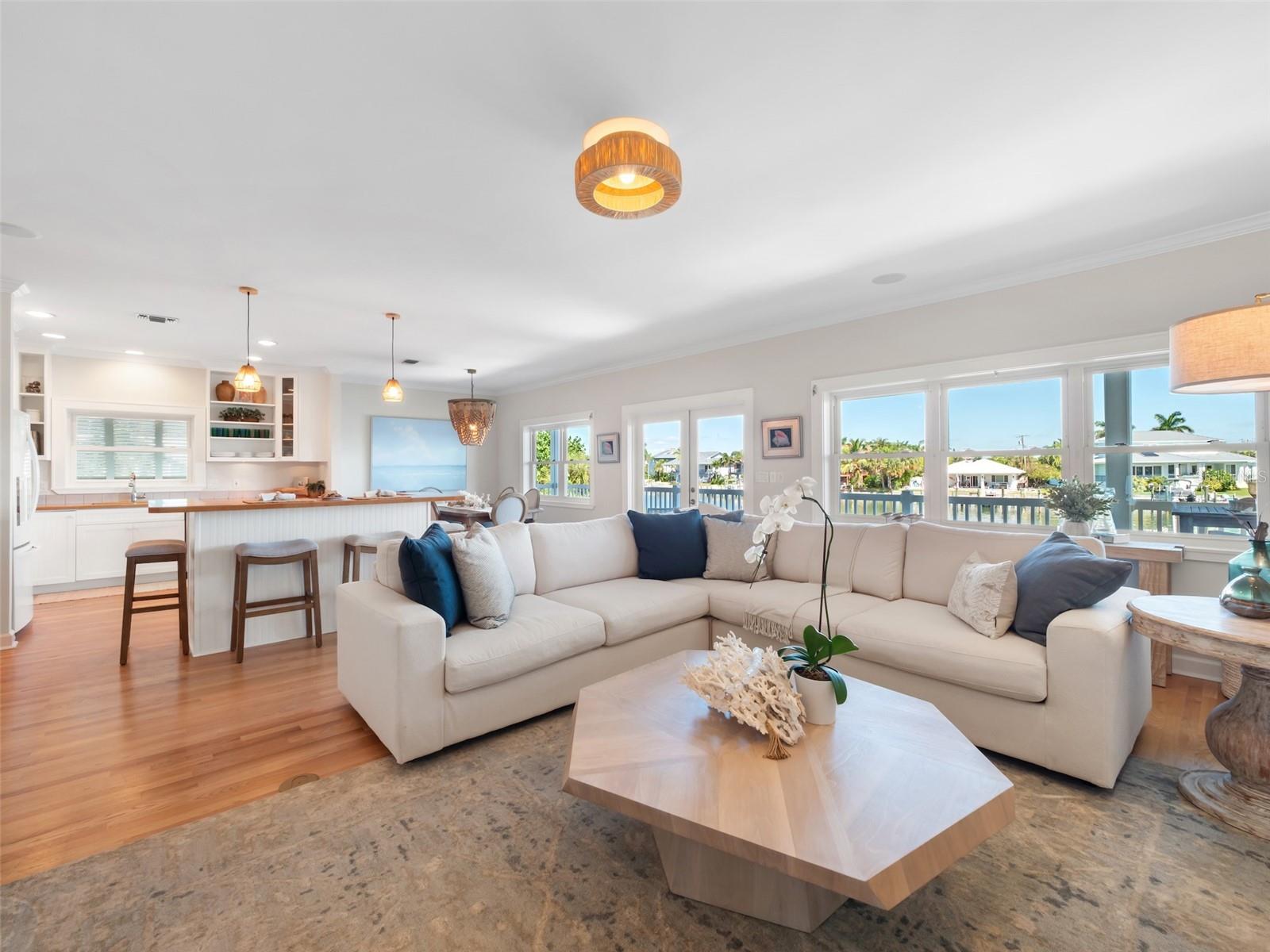 Warm woods anchor inviting entertaining area
