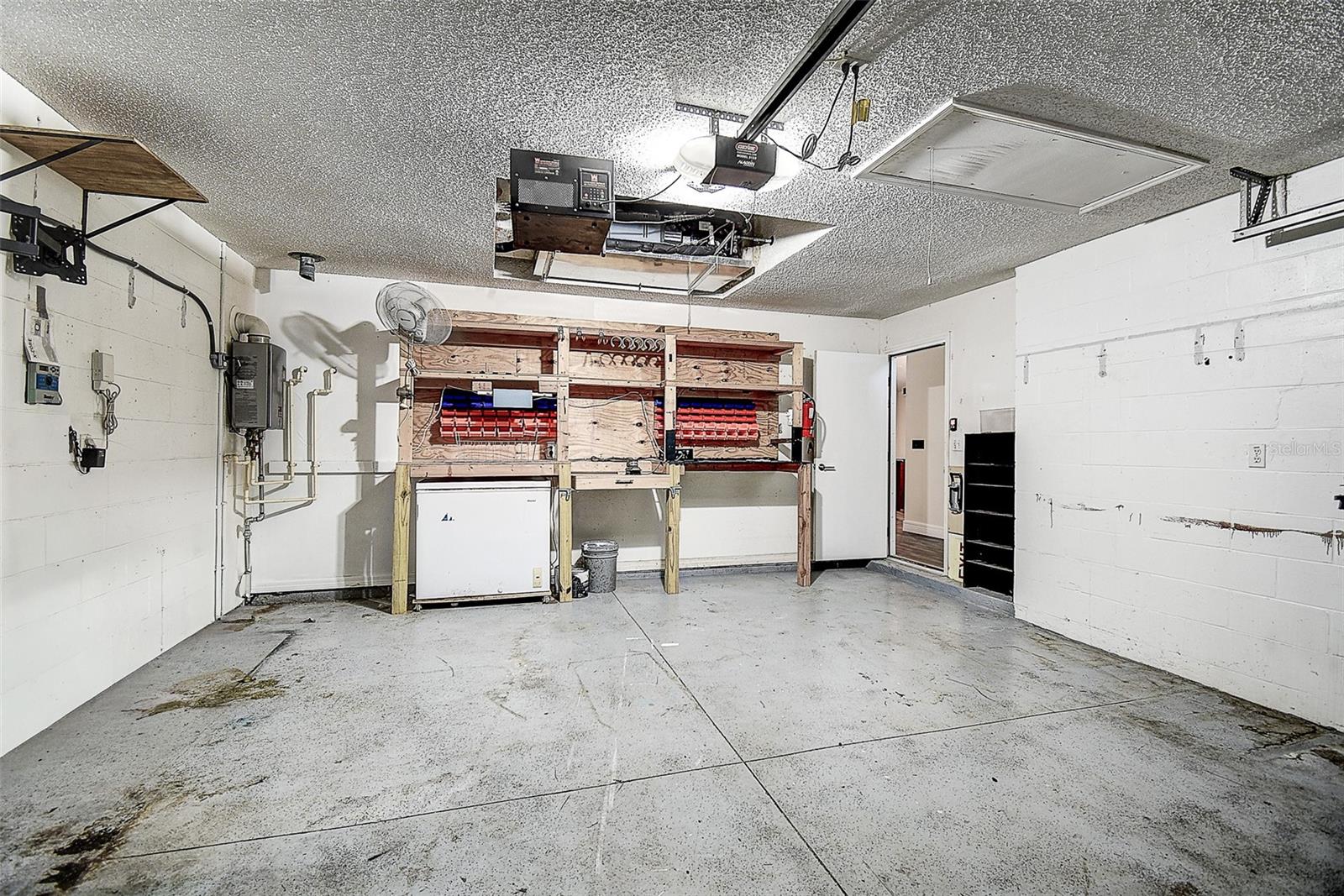 Garage with built-in work bench.
