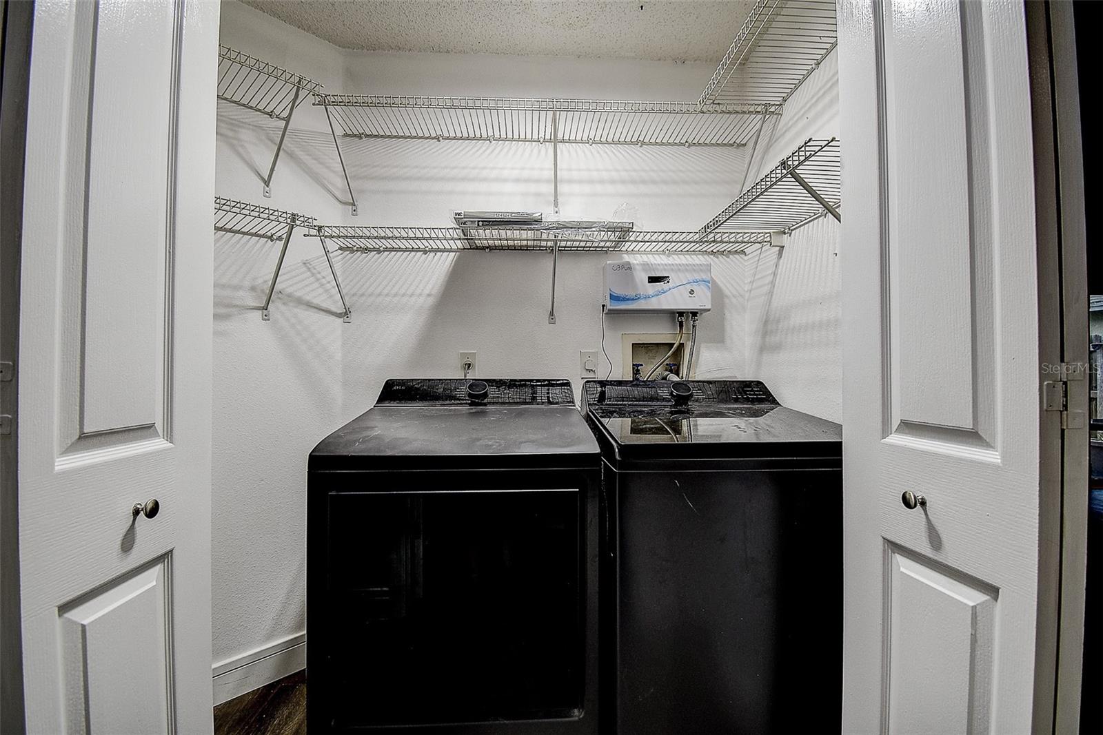 Laundry Closet in hallway near 2nd bath