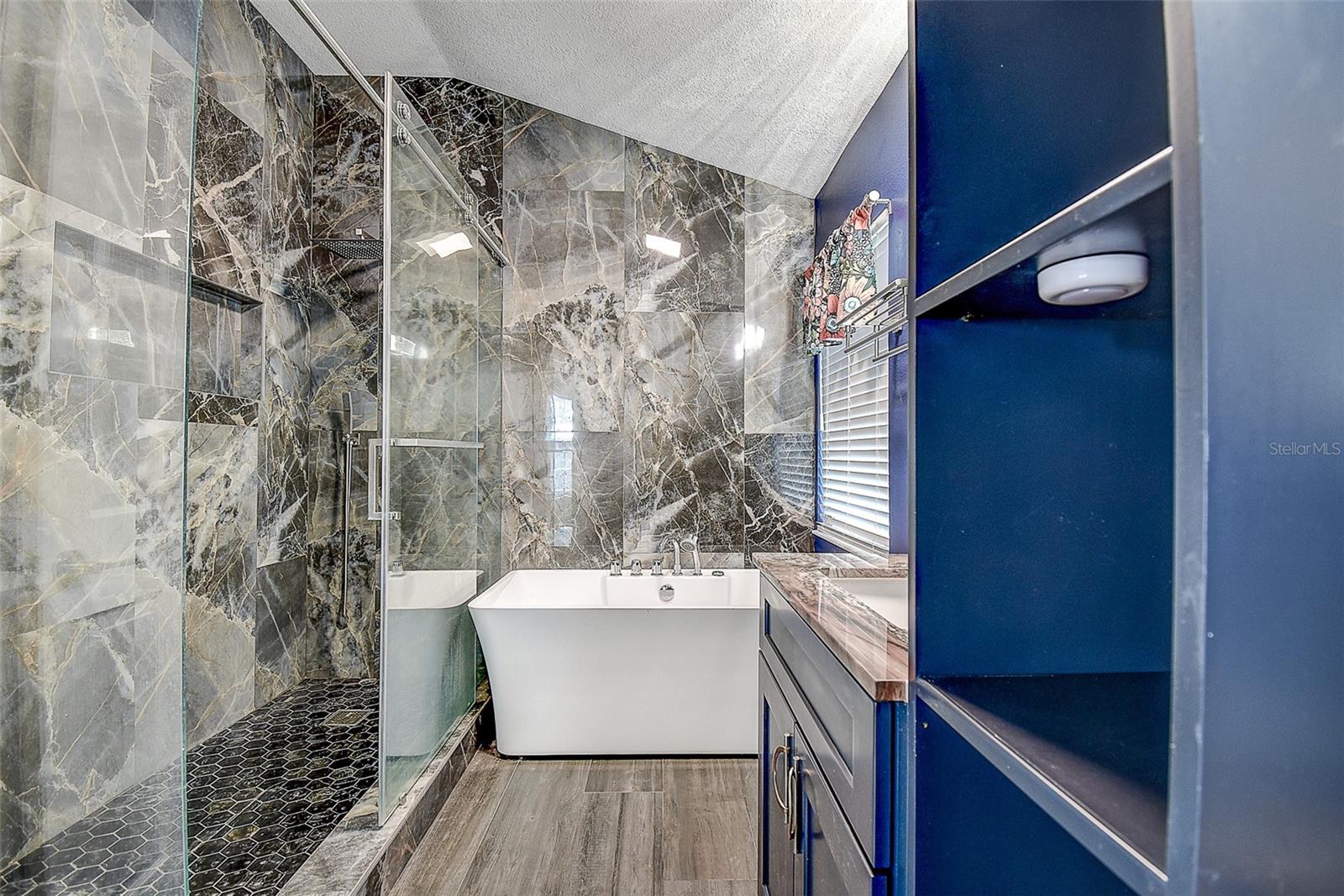 Primary bath with large walk in shower