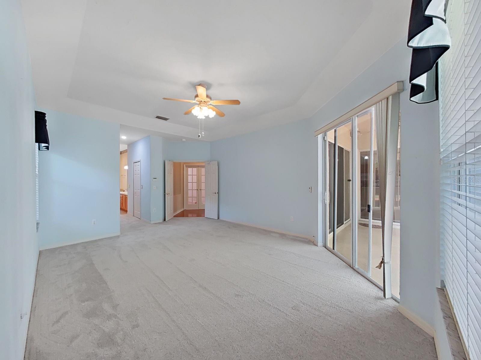 Primary Bedroom ~ Doors Open to Lanai