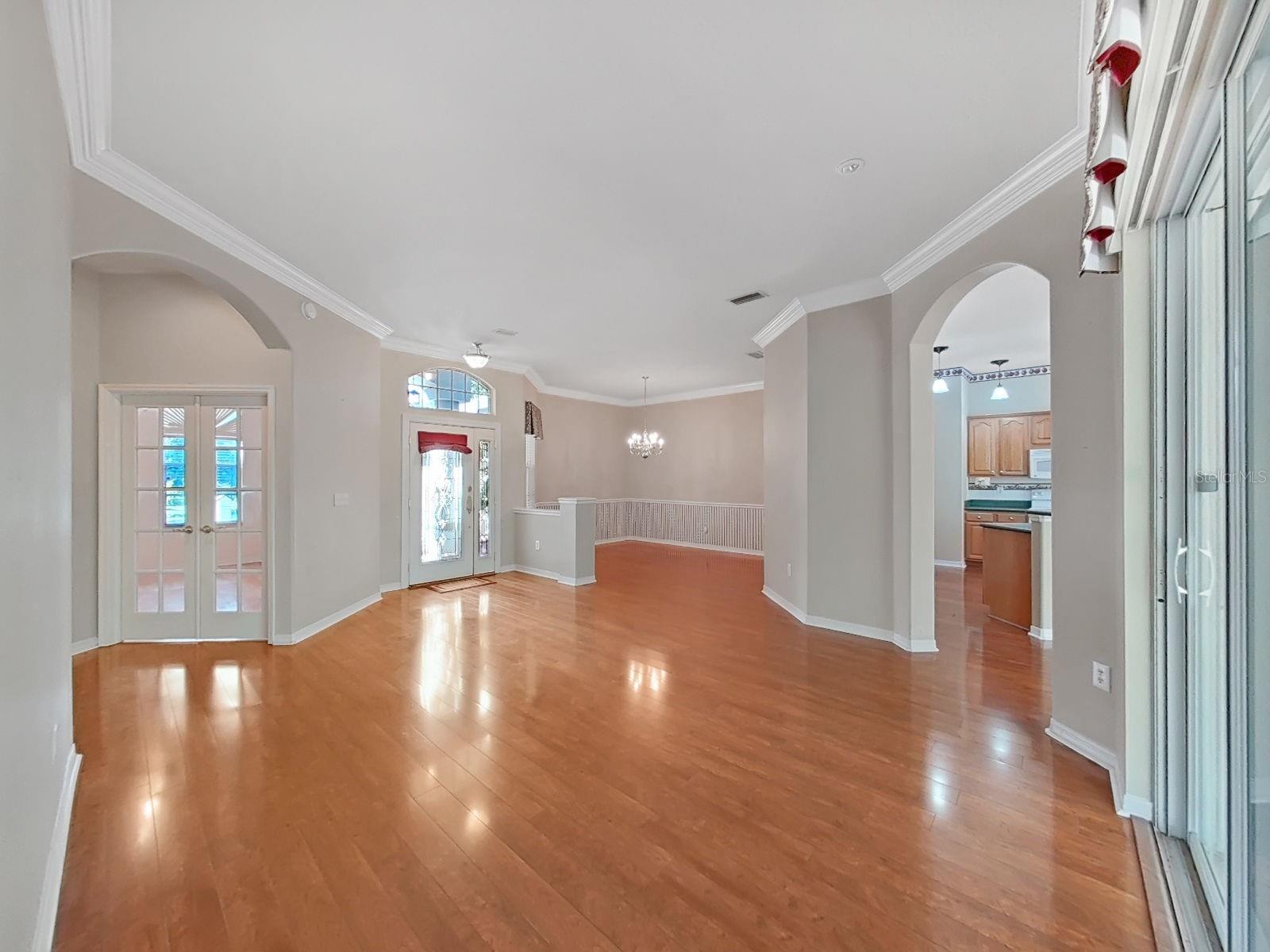 L-R:    Office ~ Front Entry ~ Dining Room ~ Kitchen ~ Living Room Area
