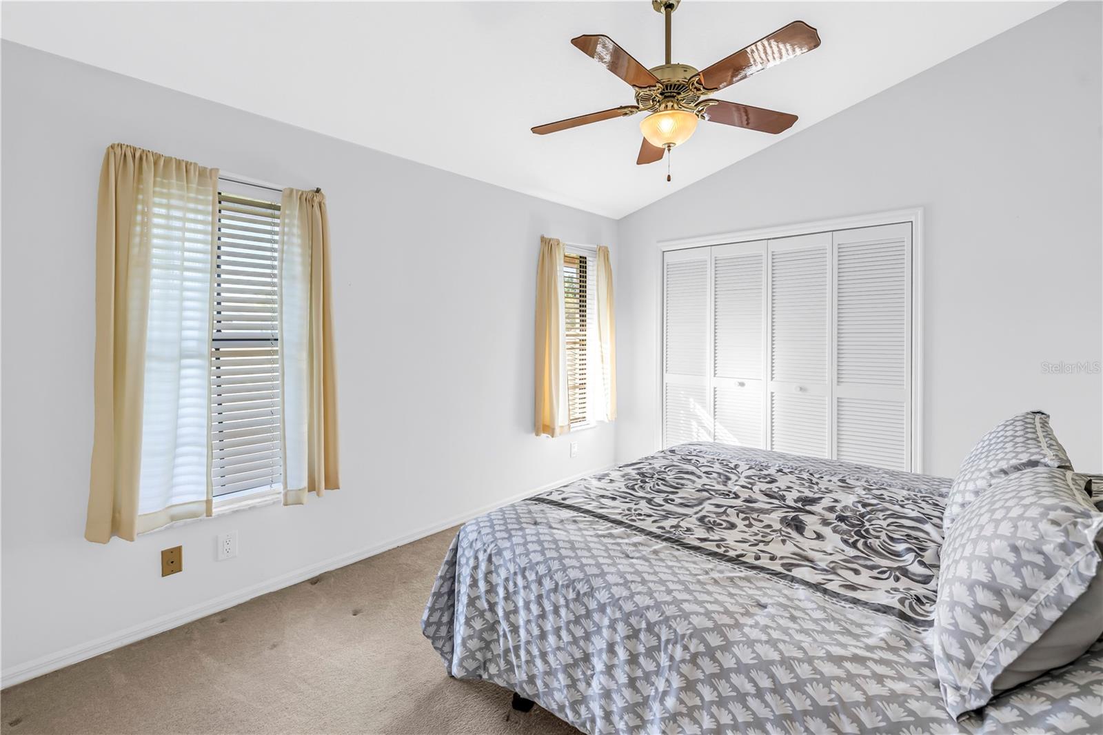 Bedroom 2 with Closet and adjacent to Bath 2
